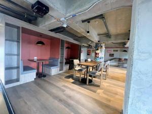 a dining room with a wooden table and chairs at Boutique hotel experience in Bogotá