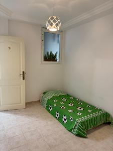 Кровать или кровати в номере Dar Mesk & Yasmine