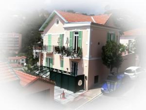 a rendering of a house with a balcony at A SCANDINAVIAN EXCLUSIVE DESIGN RESIDENCE - PREMIUM LIVING - TWO PRIVATE BALCONIES w PANORAMIC SEA VIEW - 3 MIN TO BEACH - PARKING in Menton +30 photos
