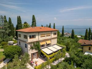 an aerial view of a house with a roof at Villa Paradiso in Sirmione