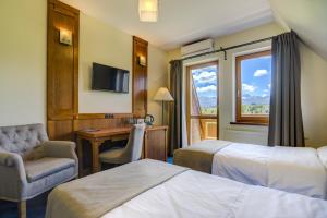 Postel nebo postele na pokoji v ubytování Hotel REDYK Ski&Relax
