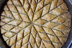 a pie in a pan with a pie crust at Hotel-Restorant Pepushaj in Shkodër