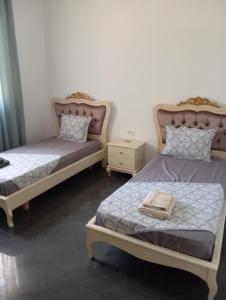 Postel nebo postele na pokoji v ubytování Maison spacieuse climatisée