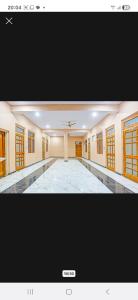 a picture of a room with a swimming pool at Hitech Hotal in Morādābād