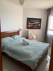 Postel nebo postele na pokoji v ubytování נופש במגדלי המלכים