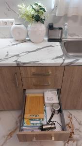 a drawer in a kitchen with a counter top at Luxury Maisonette in Ioannina +31 photos