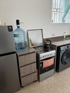 Η κουζίνα ή μικρή κουζίνα στο Sana Homes