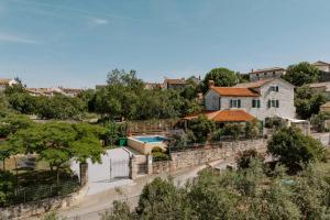 an aerial view of a house with a swimming pool at Villa Lilly in Višnjan