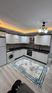 Η κουζίνα ή μικρή κουζίνα στο Sağlam Apart Otel