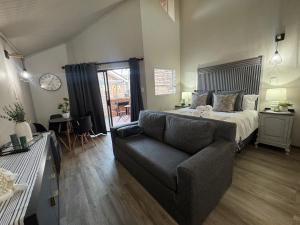 Ένα ή περισσότερα κρεβάτια σε δωμάτιο στο The Clarens Getaway