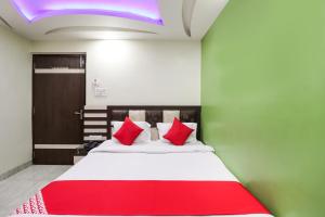 Ένα ή περισσότερα κρεβάτια σε δωμάτιο στο Hotel O Swastik regency Kusunda Junction