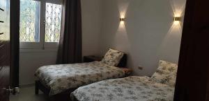 Postel nebo postele na pokoji v ubytování Jahmed Country Villa Luxor West Bank