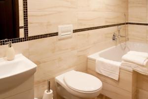 Łazienka w obiekcie Apartamenty Hotelu Pod Orłem