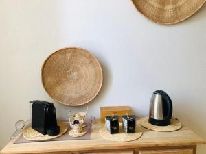 a table with two microwaves on top of it at Casita El Lobo in Montech