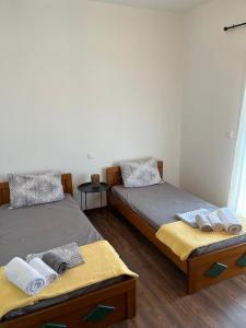 Ένα ή περισσότερα κρεβάτια σε δωμάτιο στο Village Memories +16 φωτογραφίες
