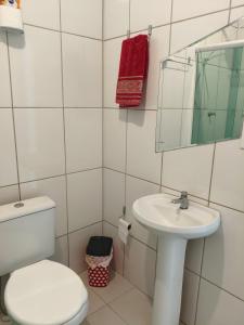 A bathroom at Apto prox Norte shop Br 470 Nei