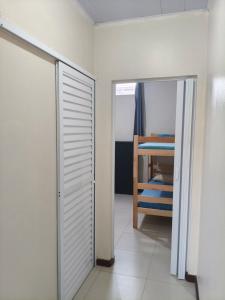 A bed or beds in a room at Apto prox Norte shop Br 470 Nei