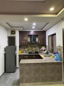 Køkken eller tekøkken på Family Pearly Gates E-11 2BHK