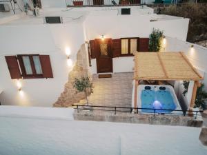 a view of a house with a pool at Lindos Zen luxury villa in Lindos