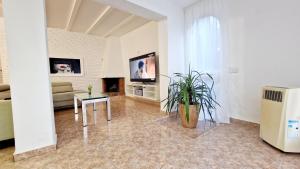 Μια τηλεόραση ή/και κέντρο ψυχαγωγίας στο Casa Fuengirola +14 φωτογραφίες