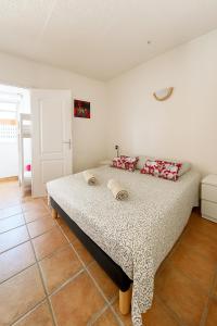 Postel nebo postele na pokoji v ubytování La Plage - 2 Apparts Clim WiFi, Familles & Amis + 11 fotografií