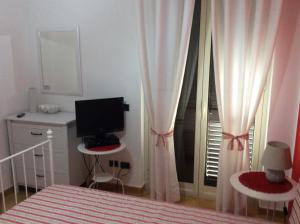 Ένα ή περισσότερα κρεβάτια σε δωμάτιο στο B&B in Residence "...a due passi dalla Scala dei Turchi"