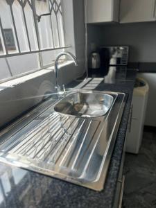 Kuchyň nebo kuchyňský kout v ubytování iNala Urban Guesthouse