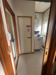 Η κουζίνα ή μικρή κουζίνα στο Minpaku Dorihu - Vacation STAY 19349