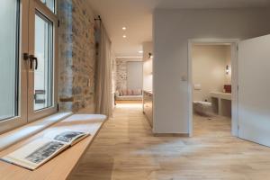 Ένα ή περισσότερα κρεβάτια σε δωμάτιο στο Nest in the City Apartment Volos +14 φωτογραφίες