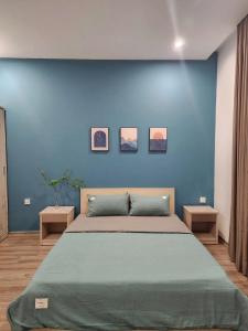 Postel nebo postele na pokoji v ubytování SH14-55, Vinhome Ocean Park 2