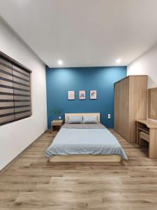 Postel nebo postele na pokoji v ubytování SH14-55, Vinhome Ocean Park 2 + 2 fotografie