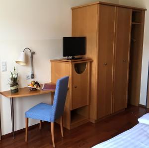 TV a/nebo společenská místnost v ubytování Hotel zur Post