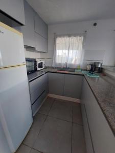 Η κουζίνα ή μικρή κουζίνα στο Casa Funes Town +17 φωτογραφίες