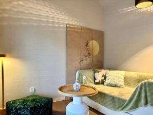 Postel nebo postele na pokoji v ubytování HangZhou West Lake Hillside Stay