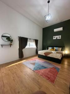 Ένα ή περισσότερα κρεβάτια σε δωμάτιο στο Homestay Private Pool +9 φωτογραφίες