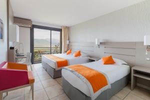 Postel nebo postele na pokoji v ubytování Best Western Plus San Damianu