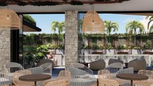 a rendering of a restaurant with tables and chairs at Novotel Sydney Cabramatta in Cabramatta
