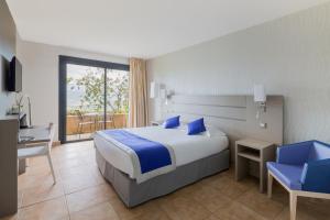 Postel nebo postele na pokoji v ubytování Best Western Plus San Damianu
