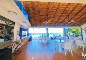 Φωτογραφία από το άλμπουμ του Beachfront Serenity Villa with Pool, AC, 1 min from the the beach, Jacuzzi, Wifi σε Sabana Grande de Palenque +45 φωτογραφίες