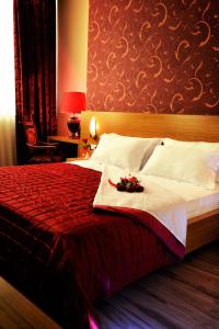 Postel nebo postele na pokoji v ubytování Hotel Austria
