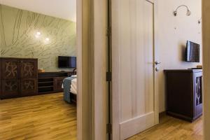 TV a/nebo společenská místnost v ubytování Murella Living