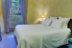 Tempat tidur dalam kamar di Casa da Belavista