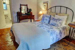 Tempat tidur dalam kamar di Casa da Belavista