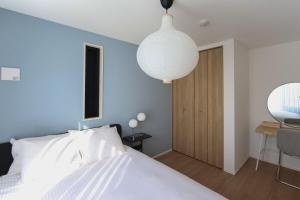 Ένα ή περισσότερα κρεβάτια σε δωμάτιο στο Fukuoka Airport 1