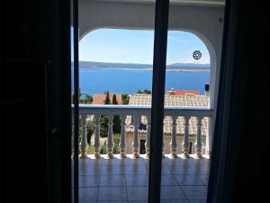 a view of the ocean from a window at Superior Apartments Ljiljana, Sanja with Sea view in Dramalj in Dramalj
