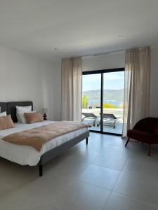 Postel nebo postele na pokoji v ubytování Torriciola location Casa Rocca