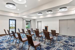 a conference room with chairs and a podium at Hampton Inn Laramie in Laramie +52 photos