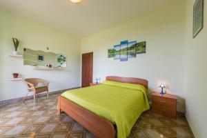 Katil atau katil-katil dalam bilik di Villa Incoronata