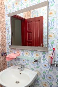 Ένα μπάνιο στο Appartement à Odza - proche aéroport et Centre ville
