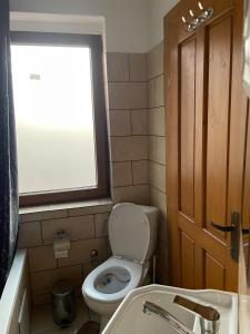 Koupelna v ubytování Apartment 1408 + 4 fotografie